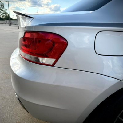BMW E82 Performance aizmugurējais spoileris, melns, glancēts, tuning detaļa uz auto no sāna