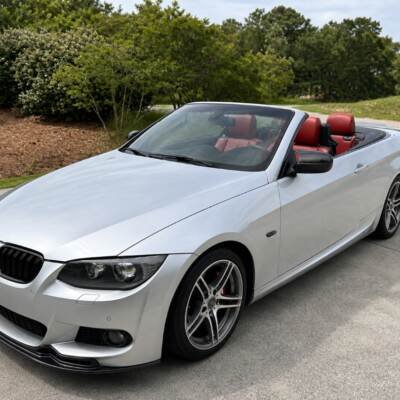 MP Style front bumper lip for BMW E92 / E93 LCI M Sport, black gloss tuning, styling parts for 3series coupe, cabrio from the left side on the car